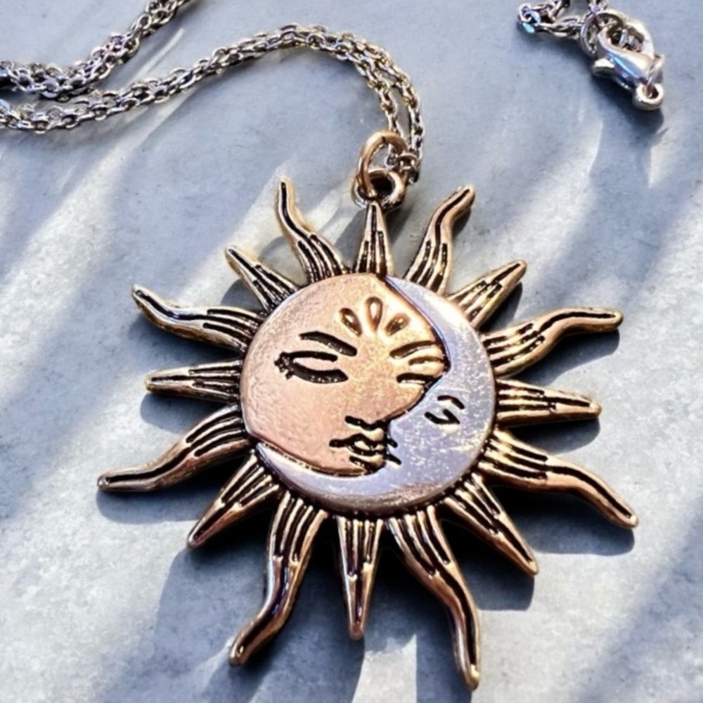 Silver and bronze toned Sun and Moon Pendant Necklace